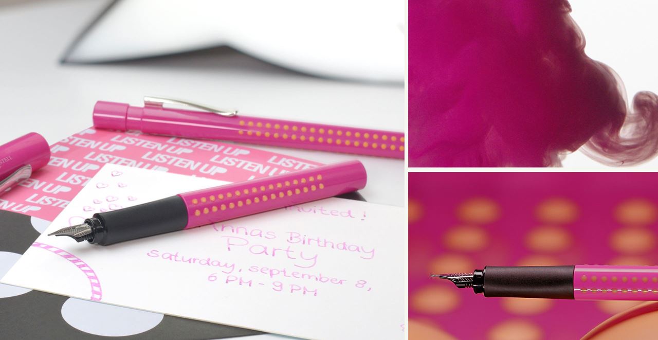 The pink grip fountain pen with orange dots lying on a birthday invitation card.